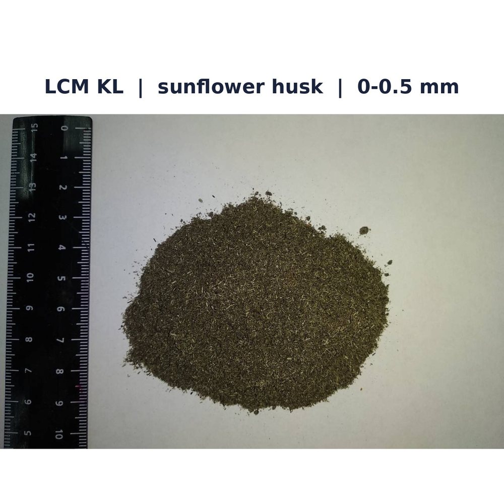 BPMD LCM grade KL from sunflower husk, particle size 0 to 0.5 mm, with ruler for scale