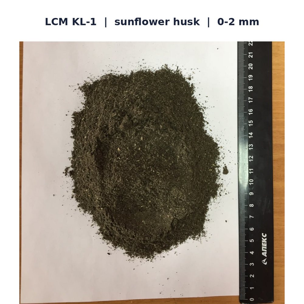 BPMD LCM grade KL-1 from sunflower husk, particle size 0 to 2 mm, with ruler for scale